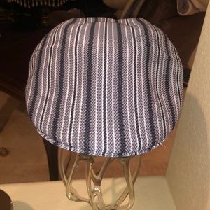 Black, gray, white stripper “Jacquard 504” Kangol hat.